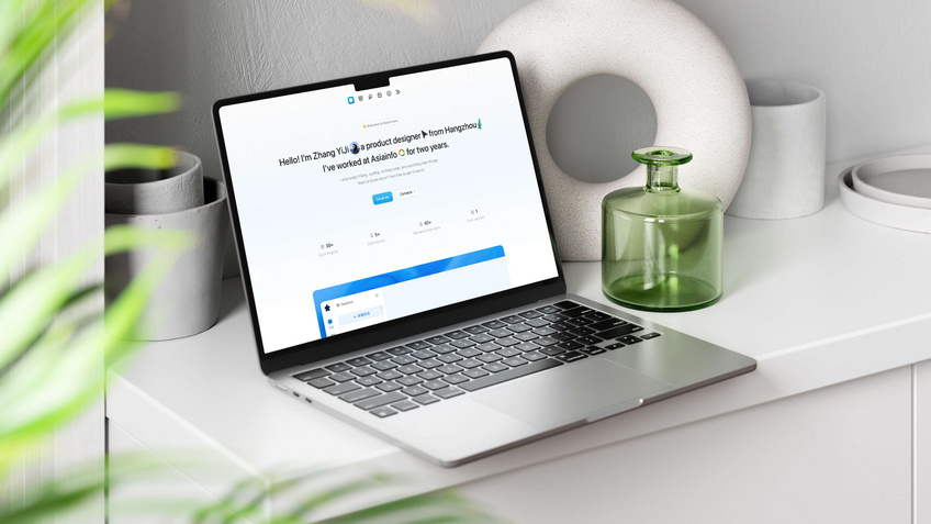 Laptop on white desk showing personal blog of yikZero, product designer. White vase, green bottle, and plants create modern home office setting.